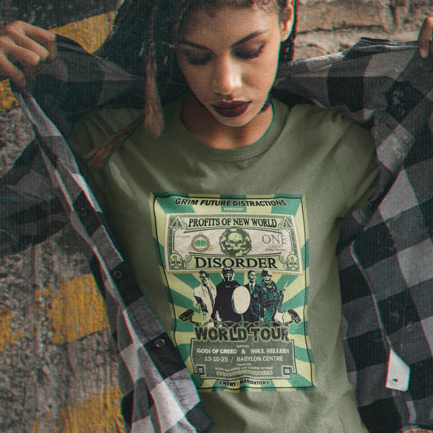 Person wearing a khaki t-shirt with a graphic design and text. A non conformist t shirt in the style of a band tour poster. This satirical t-shirt design highlights the forces that influence our society now, and for the foreseeable future. A spoof band t-shirt to create social awareness. Made from 100% organic ring-spun cotton, this anti government t shirt is unisex, high-quality, super comfy, and best of all, eco-friendly.