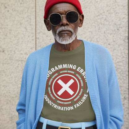 Man wearing a green t-shirt with a red and white graphic design, blue cardigan, and red beanie against a beige wall. A true conspiracy theory t-shirt. If you don't think from the same hive mind as those around you and you missed out on some media brainwashing you'll love this sarcastic and satirical view of indoctrination and human programming. Made from 100% organic ring-spun cotton, this satirical conspiracy theory t-shirt is unisex, high-quality, super comfy, and best of all, eco-friendly.