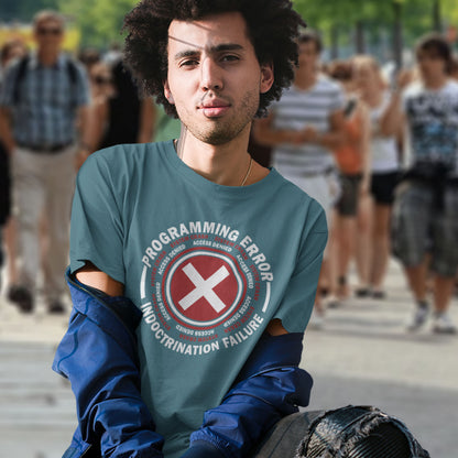 Person wearing a shirt with 'Programming Error Indoctrination Failure' text in an urban setting. A true conspiracy theory t-shirt. If you don't think from the same hive mind as those around you and you missed out on some media brainwashing you'll love this sarcastic and satirical view of indoctrination and human programming. Made from 100% organic ring-spun cotton, this satirical conspiracy theory t-shirt is unisex, high-quality, super comfy, and best of all, eco-friendly.