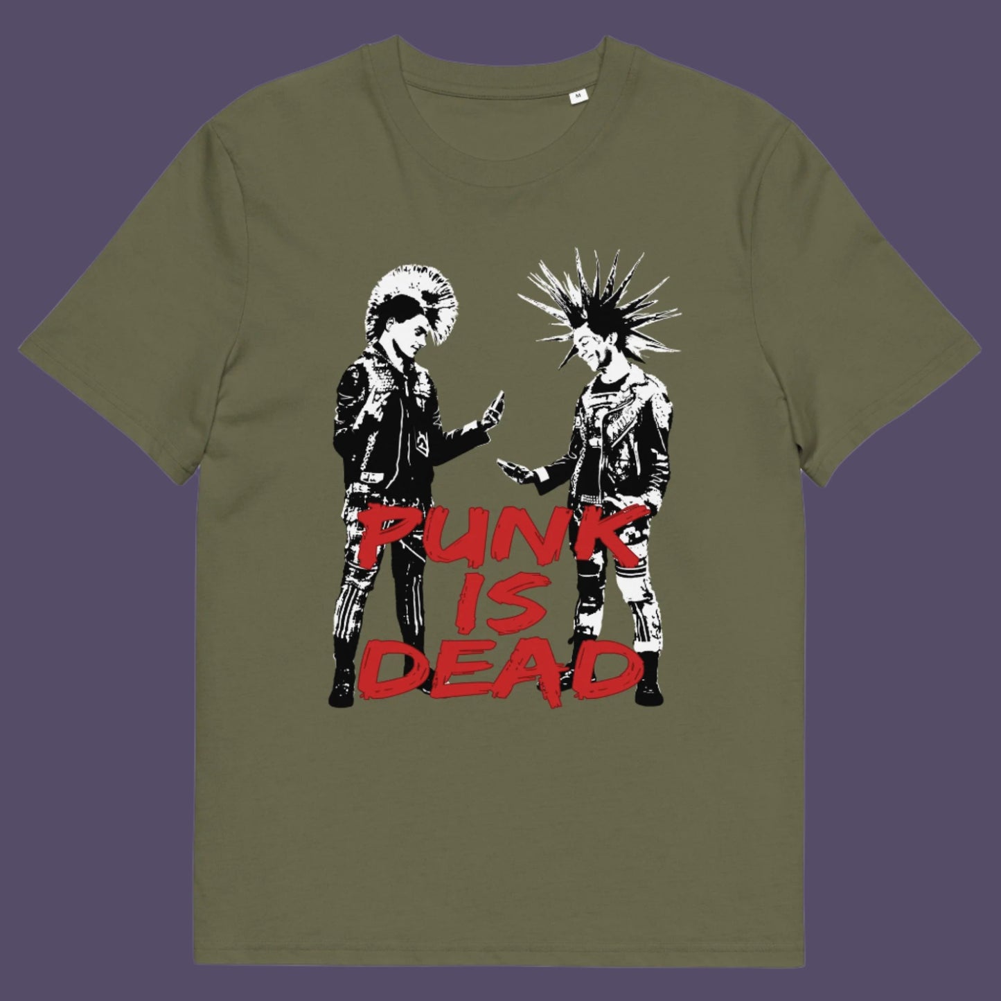 Khaki t-shirt. This controversial design questions the slogan, 'Punks not dead' by suggesting that our ever increasing reliance on mobile phones is a level of conformity and acceptance of enforced technological advancements. This is not what you expect from the free world and punks on smart phones just doesn't look right. Made from 100% organic ring-spun cotton, this counterculture t-shirt is unisex, high-quality, super comfy, and best of all, eco-friendly.
