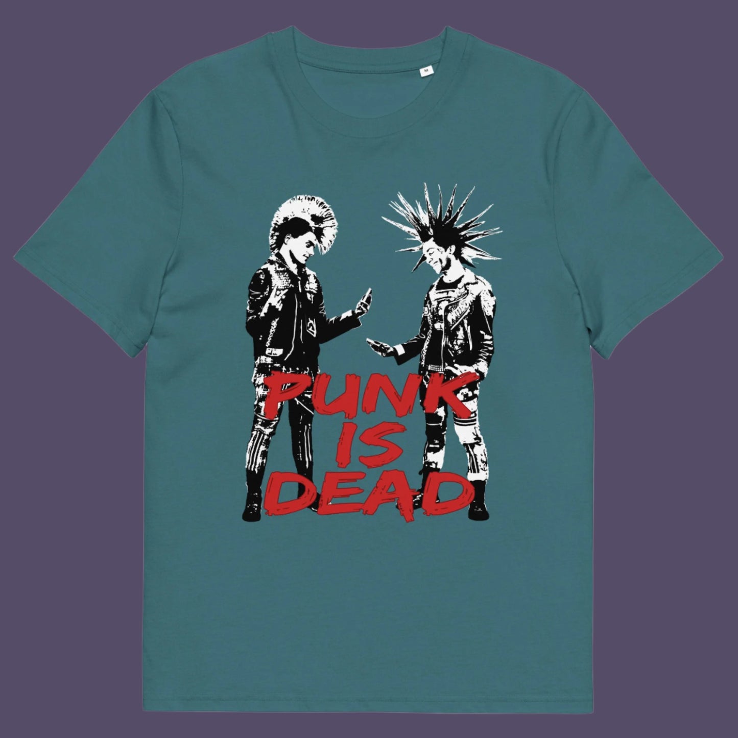 Light blue t-shirt. This controversial design questions the slogan, 'Punks not dead' by suggesting that our ever increasing reliance on mobile phones is a level of conformity and acceptance of enforced technological advancements. This is not what you expect from the free world and punks on smart phones just doesn't look right. Made from 100% organic ring-spun cotton, this counterculture t-shirt is unisex, high-quality, super comfy, and best of all, eco-friendly.