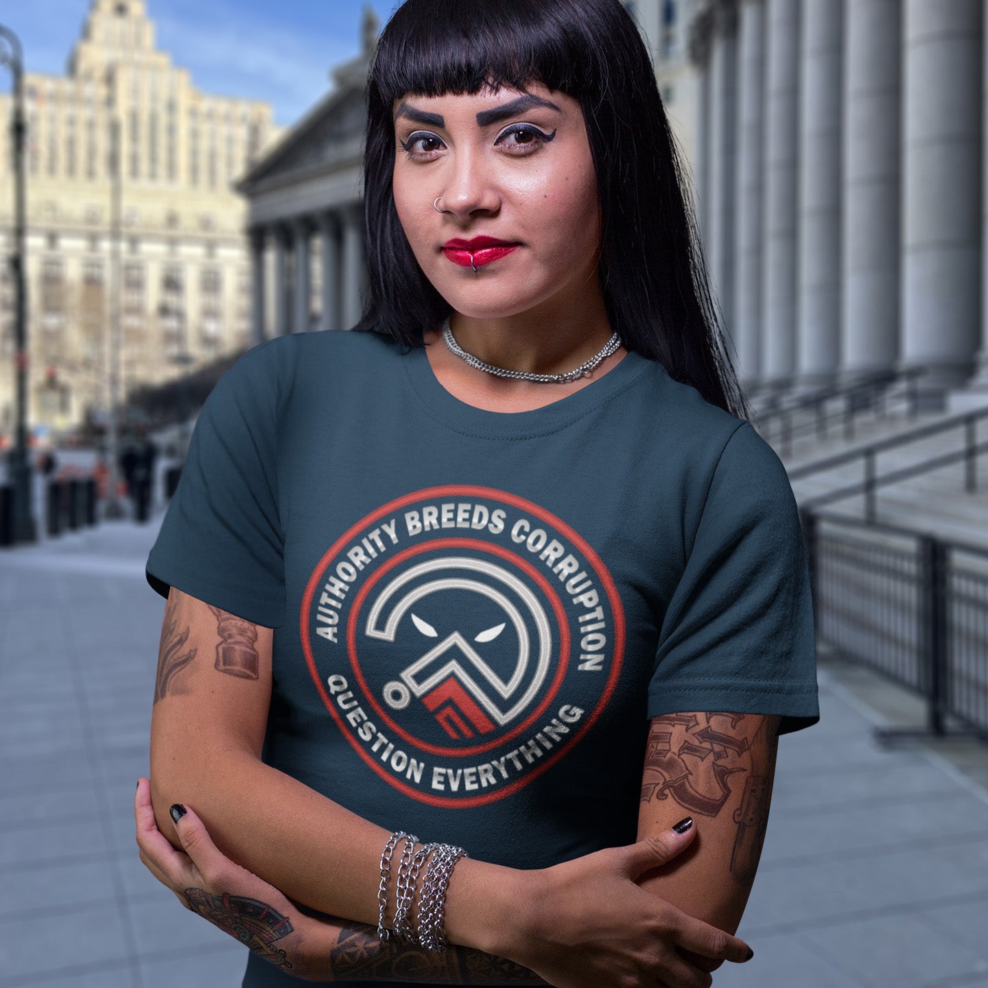 woman standing outside a court house. A question everything t shirt for everyday defiance or leading the next protest rally. Help create social awareness of the dark side of human nature, how power corrupts and authority is abused. To be worn with pride in support of a world where authority should be answerable to the people who put them there. Made from 100% organic ring-spun cotton, this broken society t shirt is unisex, high quality, super comfy, and best of all, eco-friendly.