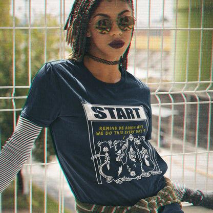 woman in a French navy t-shirt with 'rat race' design. This stencil graffiti t shirt represents the monotony of everyday working life. A unique satirical design for those times when life starts to feel a little repetitive, unnecessary, and questionable. Made from 100% organic ring-spun cotton, this urban art t shirt is unisex, high-quality, super comfy, and best of all, eco-friendly.