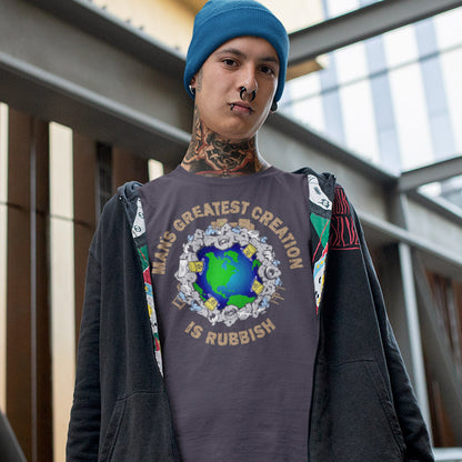 Person wearing a t-shirt with a graphic design and text, standing indoors. A satirical save the planet t shirt design. If you really think about it the biggest creation man has added to the world is actually biproduct and trash. No wonder the planet is at risk of being poisoned. Made from 100% organic ring-spun cotton, this save the planet t shirt is unisex, high-quality, super comfy, and best of all, eco-friendly.