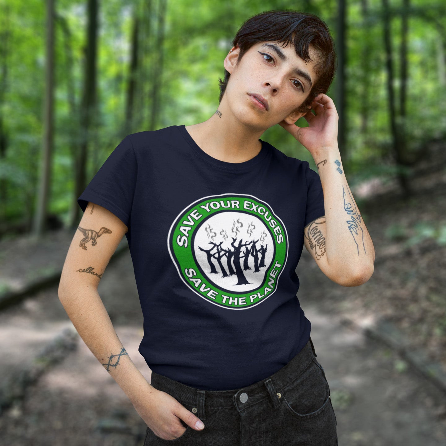 Person wearing a French navy blue t-shirt. A 'save the planet' t-shirt that promotes social awareness of environmental issues. It's time to stop making poor excuses for why our governments haven't got around to saving our planet yet. This unique environmental t-shirt is ideal for protest rallies and demonstrations about climate concern. Made from 100% organic ring-spun cotton, this environmental awareness t-shirt is unisex, high-quality, super comfy, and best of all, eco-friendly.