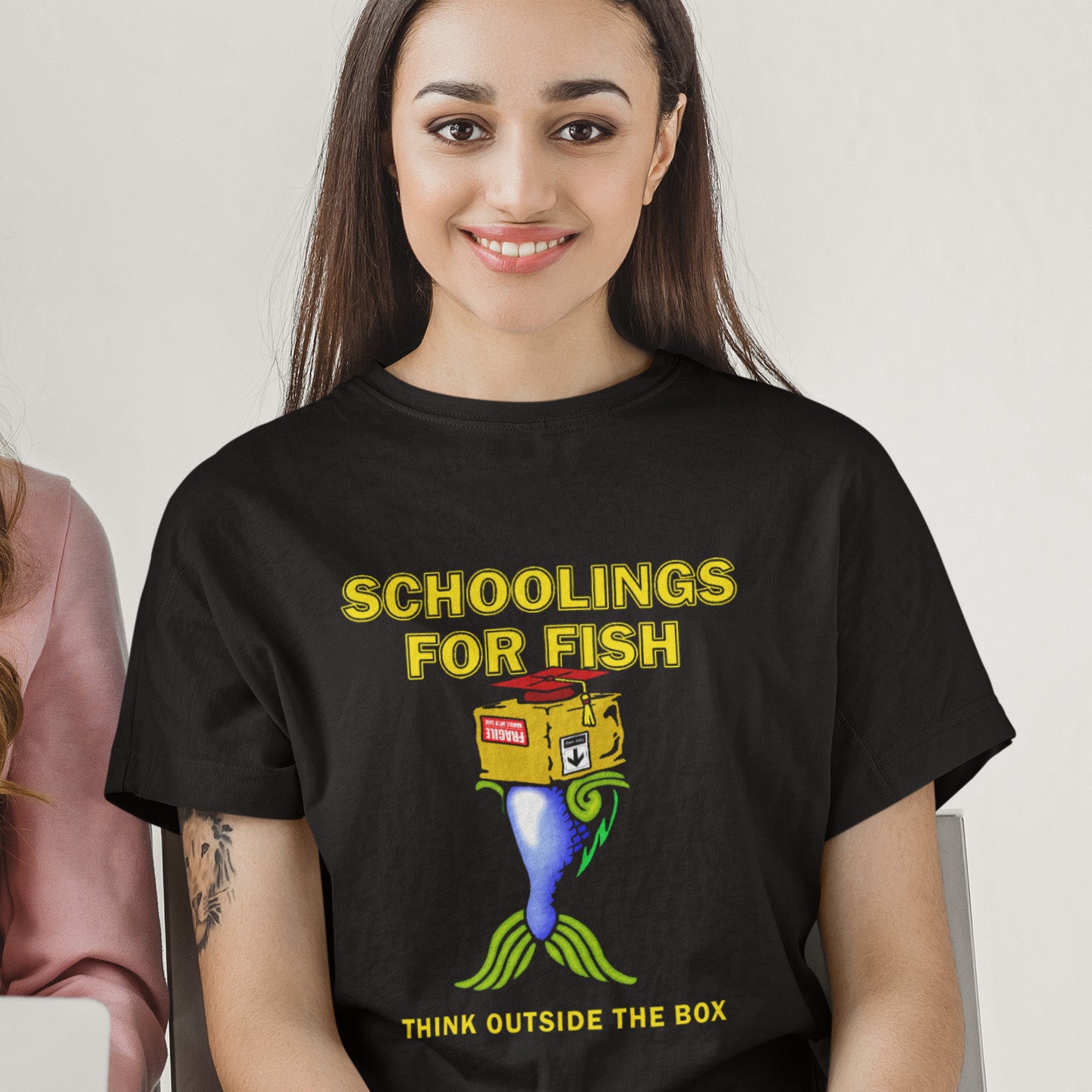 Person wearing a black t-shirt with a colourful graphic and text. This alternative education non conformist t shirt design conveys a feeling that we are not quite being taught the full picture by our educational system. Great choice for any disgruntled student. Made from 100% organic ring-spun cotton, this witty counter culture t shirt is unisex, high-quality, super comfy, and best of all, eco-friendly.