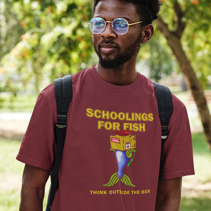 Man wearing a burgundy t-shirt with a graphic design and text, standing outdoors. This alternative education non conformist t shirt design conveys a feeling that we are not quite being taught the full picture by our educational system. Great choice for any disgruntled student. Made from 100% organic ring-spun cotton, this witty counter culture t shirt is unisex, high-quality, super comfy, and best of all, eco-friendly.