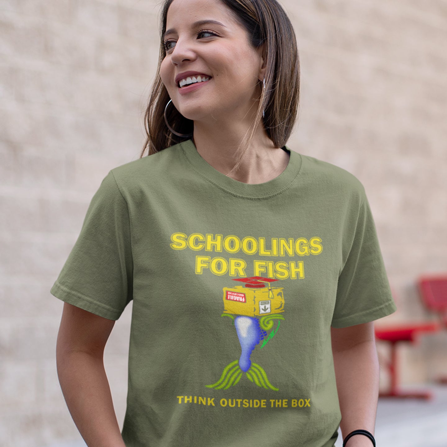 Person wearing a Khaki t-shirt with a graphic and text, standing against a neutral background. This alternative education non conformist t shirt design conveys a feeling that we are not quite being taught the full picture by our educational system. Great choice for any disgruntled student. Made from 100% organic ring-spun cotton, this witty counter culture t shirt is unisex, high-quality, super comfy, and best of all, eco-friendly.