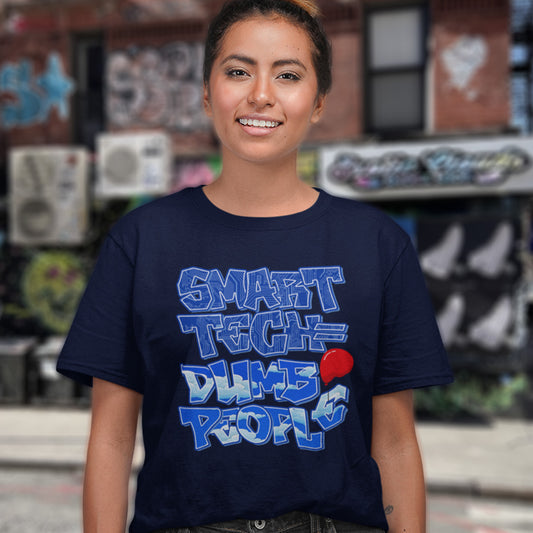 Person wearing a French navy blue t-shirt with blue text and a red circle in an urban setting. This anti ai t shirt design suggests that the smarter the technology gets the dumber the people become. This contemporary design is ideal if you like t shirts for intellectuals and would rather exercise your mind than rely on machinery to do your thinking for you. Made from 100% organic ring-spun cotton, this non conformist t shirt is unisex, high-quality, super comfy, and best of all, eco-friendly.