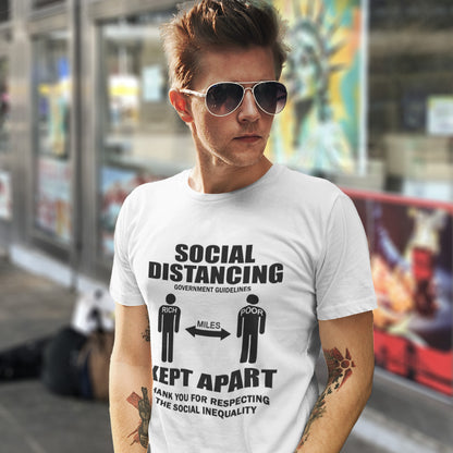 Person wearing a white t-shirt with social distancing message in an urban setting. An anti government t shirt design representing a much older form of social distancing in our society. Class inequality. This anti establishment t-shirt design promote social awareness of the class divide our system creates. Made from 100% organic ring-spun cotton, this non conformist t shirt is unisex, high-quality, super comfy, and best of all, eco-friendly.