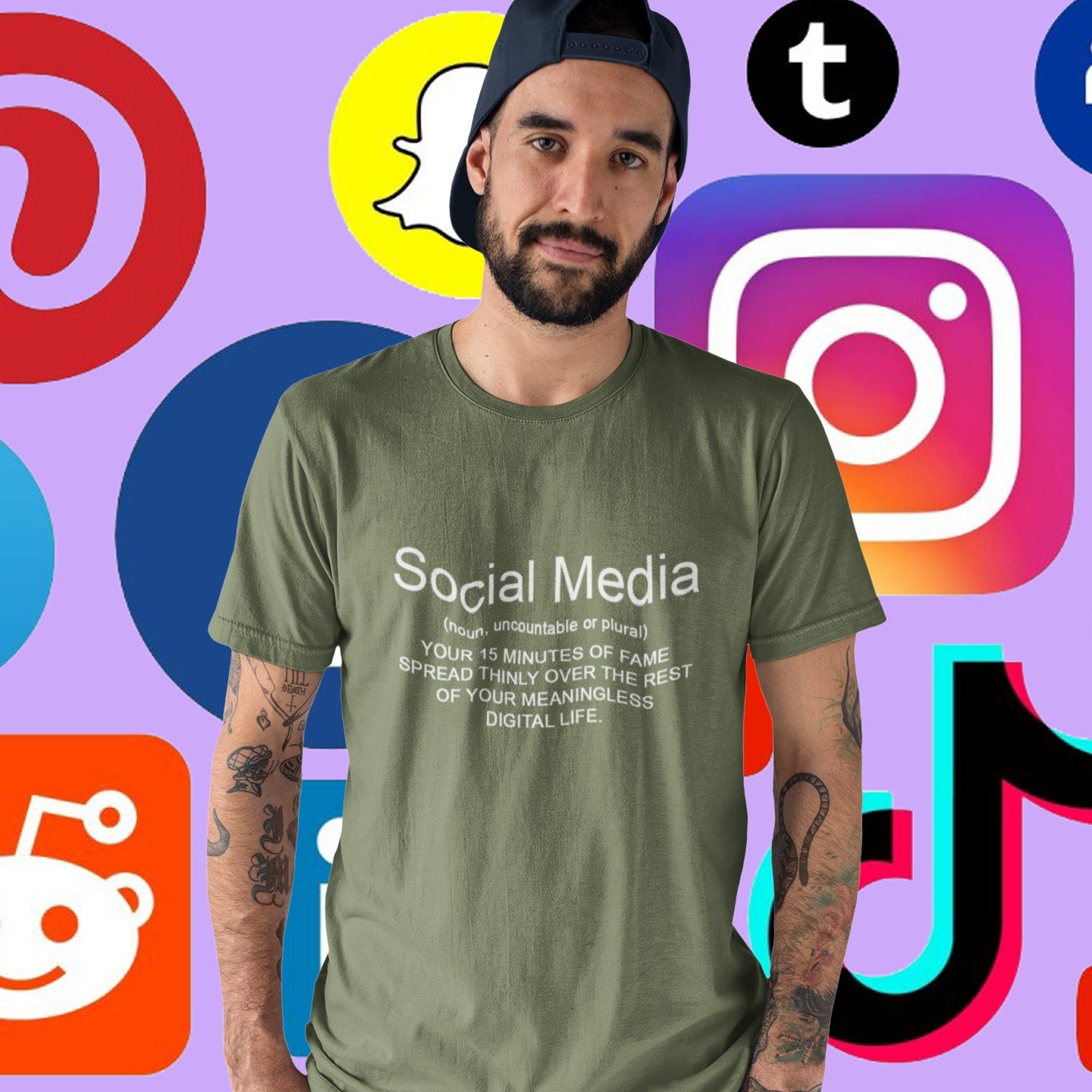 Man wearing a khaki t-shirt with social media text in front of social media platform icons. An anti-social media t-shirt with a humorous definition. A unique t-shirt design for those who still have a real life and consider 'community' to be something you can touch and walk around. Made from 100% organic ring-spun cotton, this anti social media t-shirt is unisex, high-quality, super comfy, and best of all, eco-friendly.