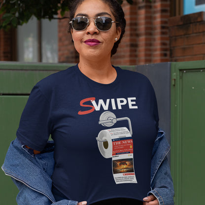 Woman wearing a navy blue t-shirt with 'SWIPE' graphic design outdoors. This anti media, non conformist t shirt design is a light hearted joke for everyone who considerably doubts the accuracy of information being provided by the mainstream media What's your next thought after reading mainstream news these days ? Made from 100% organic ring-spun cotton, this social awareness t shirt is unisex, high-quality, super comfy, and best of all, eco-friendly.