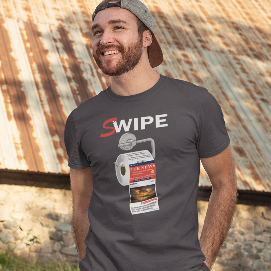 Man wearing a t-shirt with 'SWIPE' graphic design standing against a rustic wall. This anti media, non conformist t shirt design is a light hearted joke for everyone who considerably doubts the accuracy of information being provided by the mainstream media What's your next thought after reading mainstream news these days ? Made from 100% organic ring-spun cotton, this social awareness t shirt is unisex, high-quality, super comfy, and best of all, eco-friendly.