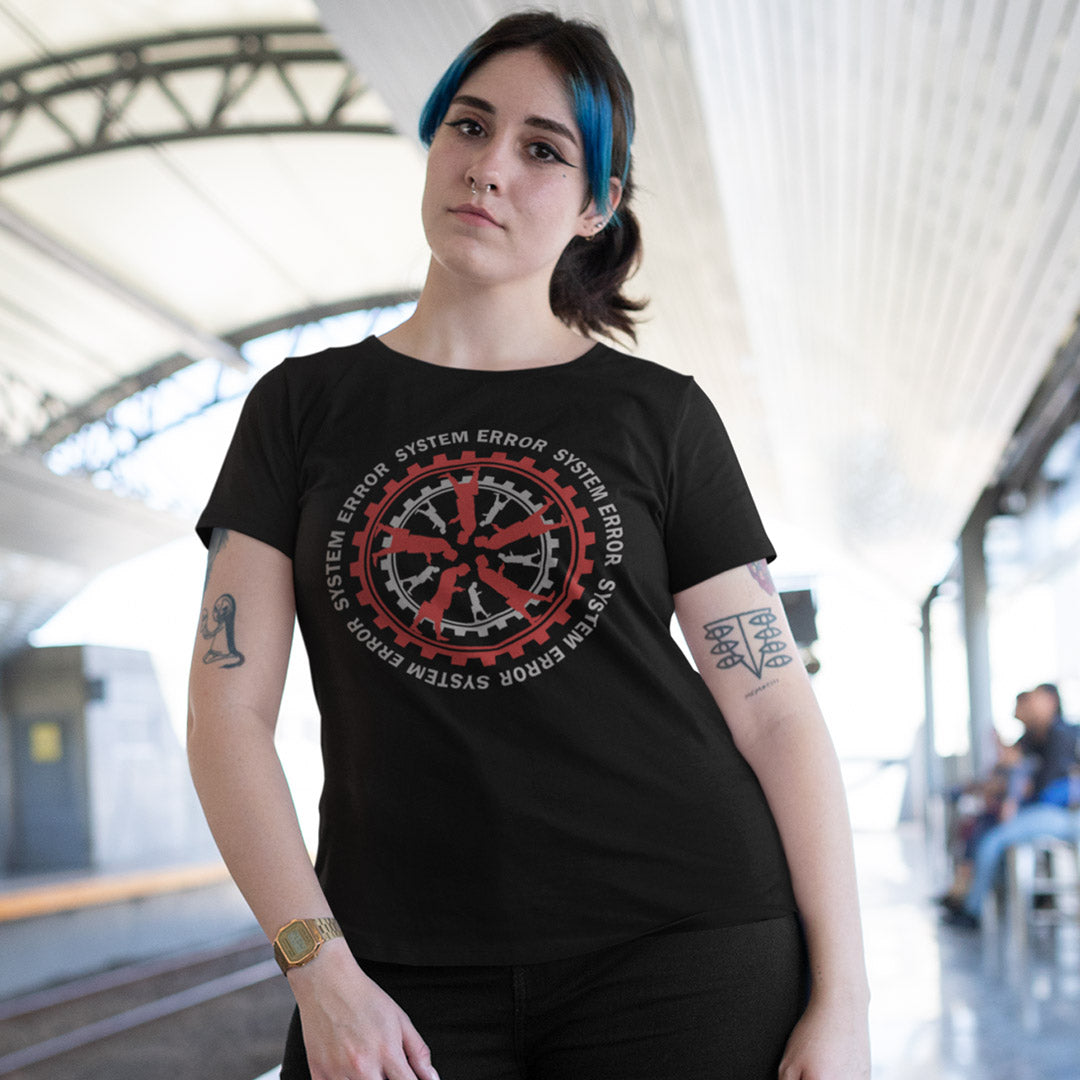 Woman wearing a black t-shirt with a red and white graphic design in an outdoor setting. An anti corporate t shirt design for people who want more out of life than a well oiled machine for soulless robots. This system error t shirt warns that it's the whole system that is the problem not the details. Made from 100% organic ring-spun cotton, this anti corporate t shirt is unisex, high-quality, super comfy, and best of all, eco-friendly.