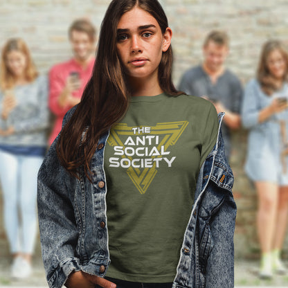 Person wearing an 'Anti Social Society' t-shirt with a blurred background of people using phones. This non conformist t shirt design gives you an oxymoron to ponder, the more and more you don't want to be a member, the more you become one. A satirical counterculture dig at modern society. Made from 100% organic ring-spun cotton, this social awareness t-shirt is unisex, high-quality, super comfy, and best of all, eco-friendly.