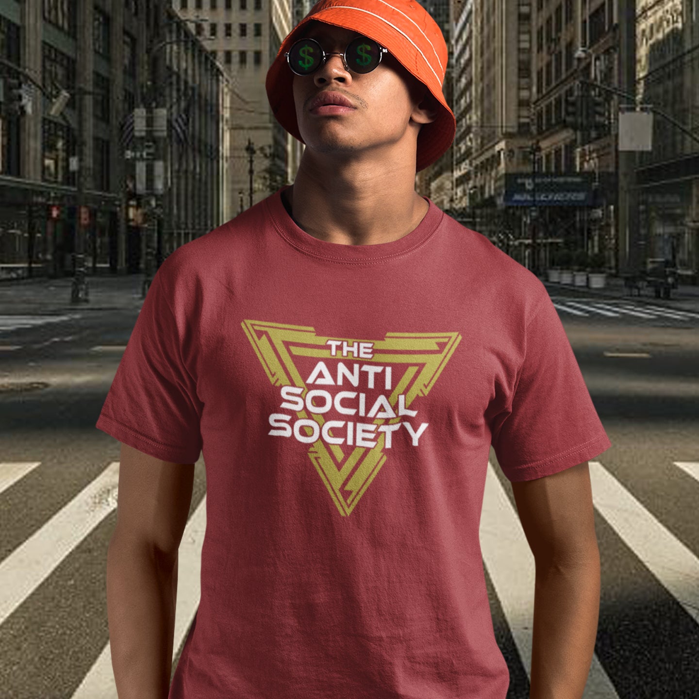 Person wearing an 'Anti Social Society' t-shirt on a city street. This anti-social t-shirt design gives you an oxymoron to ponder, the more and more you don't want to be a member, the more you become one. A satirical counterculture dig at modern society Made from 100% organic ring-spun cotton, this social awareness t-shirt is unisex, high-quality, super comfy, and best of all, eco-friendly.