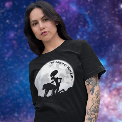 Person wearing a black t-shirt with a graphic design against a cosmic background. A hilarious alien conspiracy theory t shirt depicting an one alternative reason for the evolution of humankind on this planet. One of many possibilities as to our origins and why there is such a great distance between us and the rest of the animal kingdom. Made from 100% organic ring-spun cotton, this conspiracy theory t shirt is unisex, high-quality, super comfy, and best of all, eco-friendly.