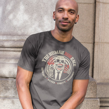 Man wearing a grey t-shirt with a graphic design sitting on stone steps. This broken society t shirt exposes the dark side of people. A great urban art design if you believe the human race has descended into a disgrace and we need educating about our own weaknesses before it's too late. Made from 100% organic ring-spun cotton, these social issues t shirts are unisex, high quality, super comfy, and best of all, eco-friendly.