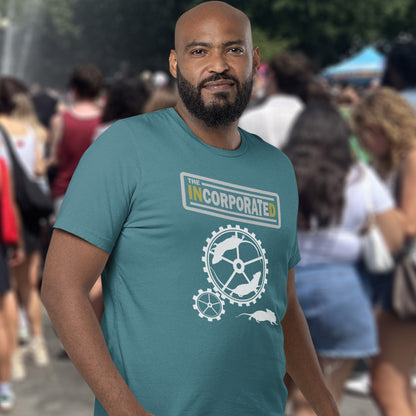 Man wearing a stargazer t-shirt with a logo and text, standing in a crowd. This non conformist t shirt questions the effects of a corporate run society. Have we just created a corporate cult to follow ? A satirical and alternative view of the modern rat race. Made from 100% organic ring-spun cotton, this counter culture t shirt is unisex, high-quality, super comfy, and best of all, eco-friendly.