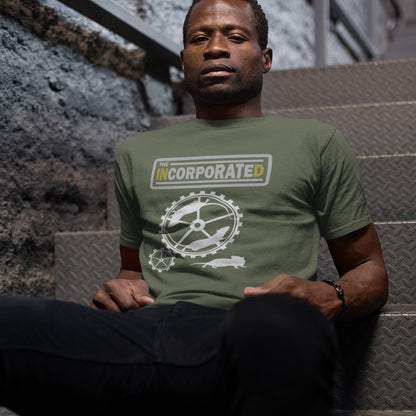 Man sitting on stairs wearing a Khaki t-shirt. This political economic t-shirts questions the effects of a corporate run society. A satirical and alternative view of the modern rat race. Made from 100% organic ring-spun cotton, this counter culture t-shirt is unisex, high-quality, super comfy, and best of all, eco-friendly.