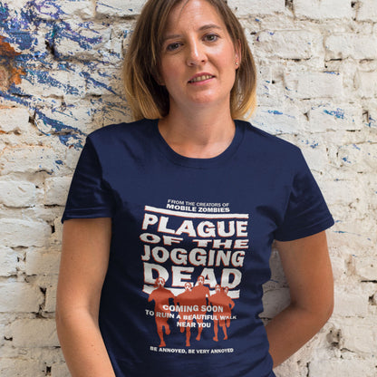 Person wearing a French navy blue t-shirt with humorous text design against a textured wall. A social issues t shirt about jogging in a horror movie design. Just when you thought it was safe to go out for a nice relaxing walk. Made from 100% organic ring-spun cotton, this social awareness t-shirt is unisex, high-quality, super comfy, and best of all, eco-friendly.