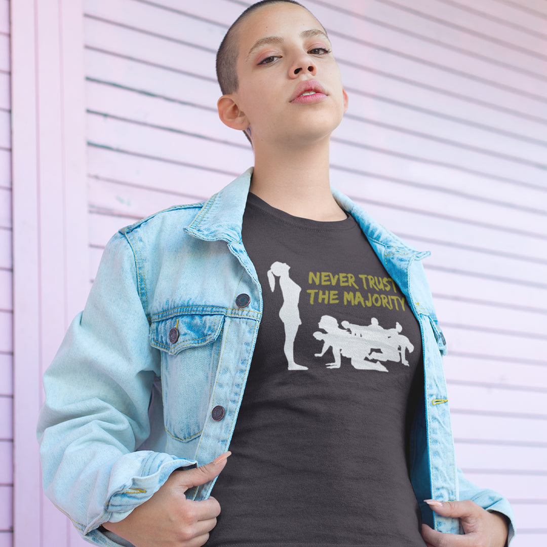 Person wearing a dark t-shirt , standing against a light-coloured wall. This self worth t shirt promotes independent thought. In this era of manipulation, indoctrination, misinformation and gaslighting, you have to think twice before believing what the majority of people think. Promote independent thinking and diversity with this satirical 'think outside the box' design. Made from 100% organic ring-spun cotton, this non conformist t shirt is unisex, high quality, super comfy, and best of all, eco-friendly.