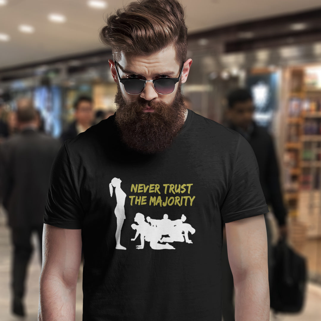 Man wearing a black t-shirt. This self worth t shirt promotes independent thought. In this era of manipulation, indoctrination, misinformation and gaslighting, you have to think twice before believing what the majority of people think. Promote independent thinking and diversity with this satirical 'think outside the box' design. Made from 100% organic ring-spun cotton, this non conformist t shirt is unisex, high quality, super comfy, and best of all, eco-friendly.