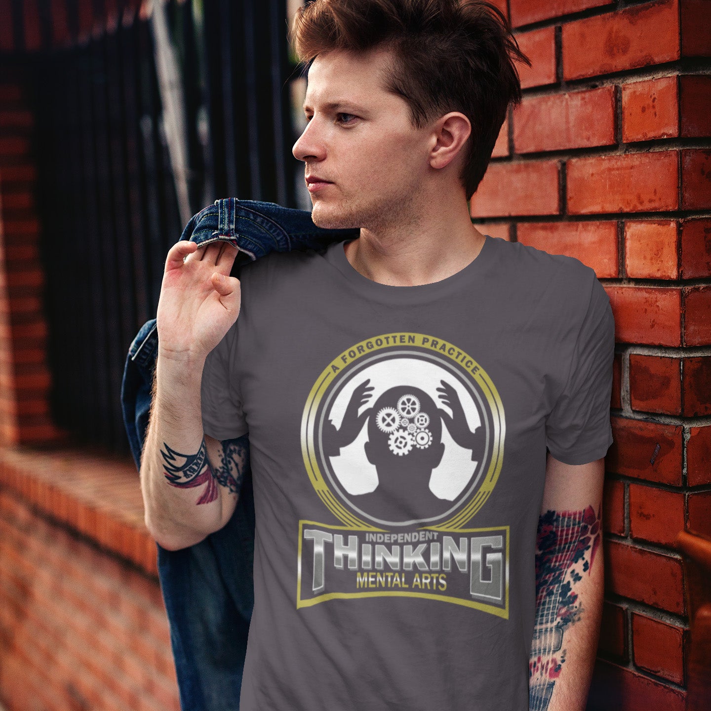 Person wearing a t-shirt with a graphic design and text, standing against a brick wall. A satirical t-shirt suggesting independent thinking is a forgotten art since we let machines think for us. Promote independent thinking with this some what sarcastic t-shirt. Made from 100% organic ring-spun cotton, this satirical &amp; sarcastic t-shirt is unisex, high-quality, super comfy, and best of all, eco-friendly.