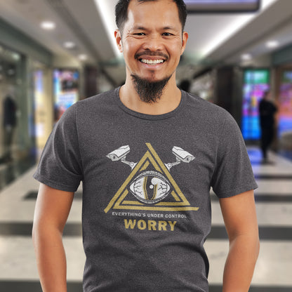 Man wearing an anthracite t-shirt with a graphic design in an indoor setting. A conspiracy theory t-shirt for all that see paranoia as a necessity. This design is a must if your imagination is colourful enough to believe we are being controlled by reptilian alien overlords. Made from 100% organic ring-spun cotton, this alien conspiracy theory t-shirt is unisex, high-quality, super comfy, and best of all, eco-friendly.