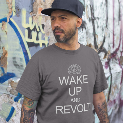 Man wearing an anthracite t-shirt with 'Wake Up and Revolt' text in front of a graffiti-covered wall. This satirical 'stay calm' anti government t shirt suggests we have been calm too long and need of waking up and fighting for our right instead. Keeping calm got us into this mess, it's time to wake up. Made from 100% organic ring-spun cotton, this activist t shirt design is unisex, high-quality, super comfy, and best of all, eco-friendly.