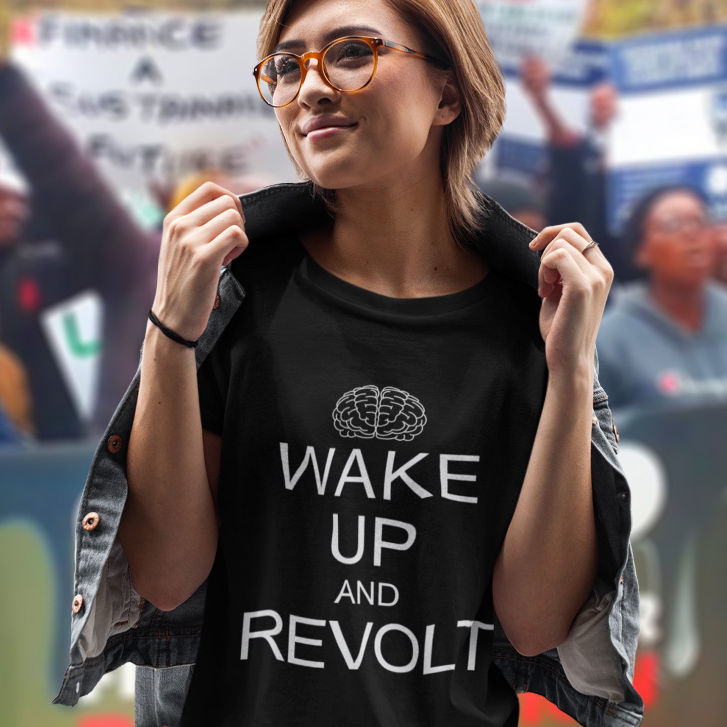 Person wearing a black t-shirt with 'Wake Up and Revolt' text in a protest setting. This satirical 'stay calm' anti government t shirt suggests we have been calm too long and need of waking up and fighting for our right instead. Keeping calm got us into this mess, it's time to wake up. Made from 100% organic ring-spun cotton, this activist t shirt design is unisex, high-quality, super comfy, and best of all, eco-friendly.