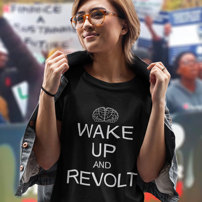 Person wearing a black t-shirt with 'Wake Up and Revolt' text in a protest setting. This satirical 'stay calm' t-shirt suggests we have been calm too long and need of waking up and fighting for our right instead. Keeping calm got us into this mess, it's time to wake up. Made from 100% organic ring-spun cotton, this counterculture t-shirt is unisex, high-quality, super comfy, and best of all, eco-friendly.
