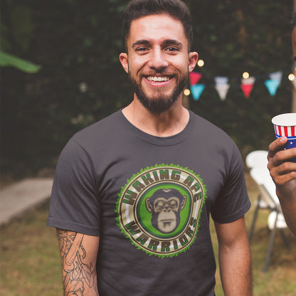 Man wearing a t-shirt with a graphic design, standing outdoors with blurred background. The message that comes with this original save the planet t shirt design is one of resistance to concrete jungles, processed food and plastic people. Ideal for anyone with environmental concern or any doubts about an A.I take over. Awaken your inner primate. Made from 100% organic ring-spun cotton, this save the Earth t shirt is unisex, high-quality, super comfy, and best of all, eco-friendly.