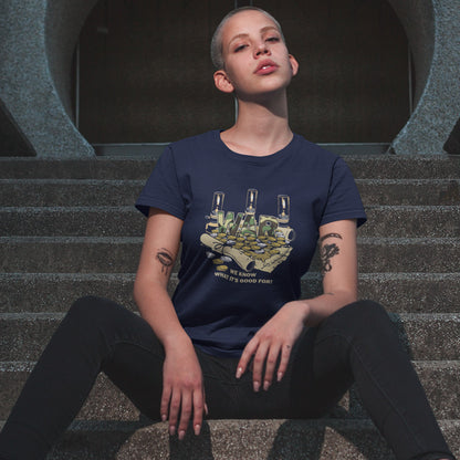 A person sitting on concrete stairs wearing a navy blue graphic t-shirt with a hand holding cash and the text 'WAR".