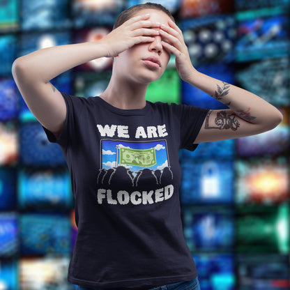 Woman with hands over her eyes, wearing a "we are flocked" t shirt. A funny broken society t shirt depicting people as a flock of sheep obsessed with money and screens. This urban art design uses Satirical humour to address the direction of our society, and the main forces of attraction in it. Made from 100% organic ring-spun cotton, these social issues t shirts are unisex, high quality, super comfy, and best of all, eco-friendly.
