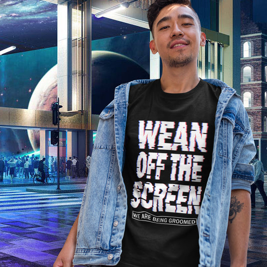 Man wearing a black t-shirt with text in an urban setting. This media based conspiracy theory t-shirt suggests there is more to digital media and entertainment than meets the eye. An anti mobile abuse slogan in a unique design to increase social awareness of too much screen time. Made from 100% organic ring-spun cotton, this conspiracy theory t-shirt is unisex, high-quality, super comfy, and best of all, eco-friendly.