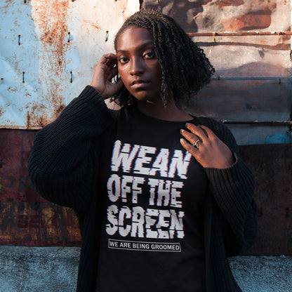 Person wearing a black sweater with text 'WEAN OFF THE SCREEN' against a textured wall. This media based conspiracy theory t-shirt suggests there is more to digital media and entertainment than meets the eye. An anti mobile abuse slogan in a unique design to increase social awareness of too much screen time. Made from 100% organic ring-spun cotton, this conspiracy theory t-shirt is unisex, high-quality, super comfy, and best of all, eco-friendly.
