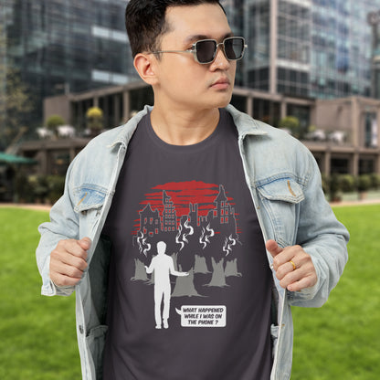 Man wearing a dark t-shirt with a graphic design outdoors. This environmental concern t-shirt asks the question Is the mobile phone the ultimate distraction from the real issues going on in the World. Let's put down the phone and save the planet. Climate concern is not an app. Made from 100% organic ring-spun cotton, this social awareness &amp; environmental concern t-shirt is unisex, high-quality, super comfy, and best of all, eco-friendly.