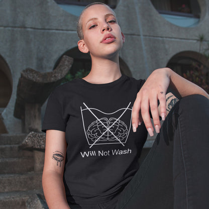 Girl sitting on steps. A self worth t shirt promoting a strong mind and a resistance to brainwashing. this unique anti-establishment t-shirt design is a play on washing instructions and highlights the mass influence and indoctrination in modern society. Made from 100% organic ring-spun cotton, this clever slogan t shirt is unisex, high-quality, super comfy, and best of all, eco-friendly.
