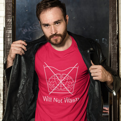 Man wearing a red t-shirt with a graphic design and text, standing against a dark background. A self worth t shirt promoting a strong mind and a resistance to brainwashing. this unique anti-establishment t-shirt design is a play on washing instructions and highlights the mass influence and indoctrination in modern society. Made from 100% organic ring-spun cotton, this clever slogan t shirt is unisex, high-quality, super comfy, and best of all, eco-friendly.
