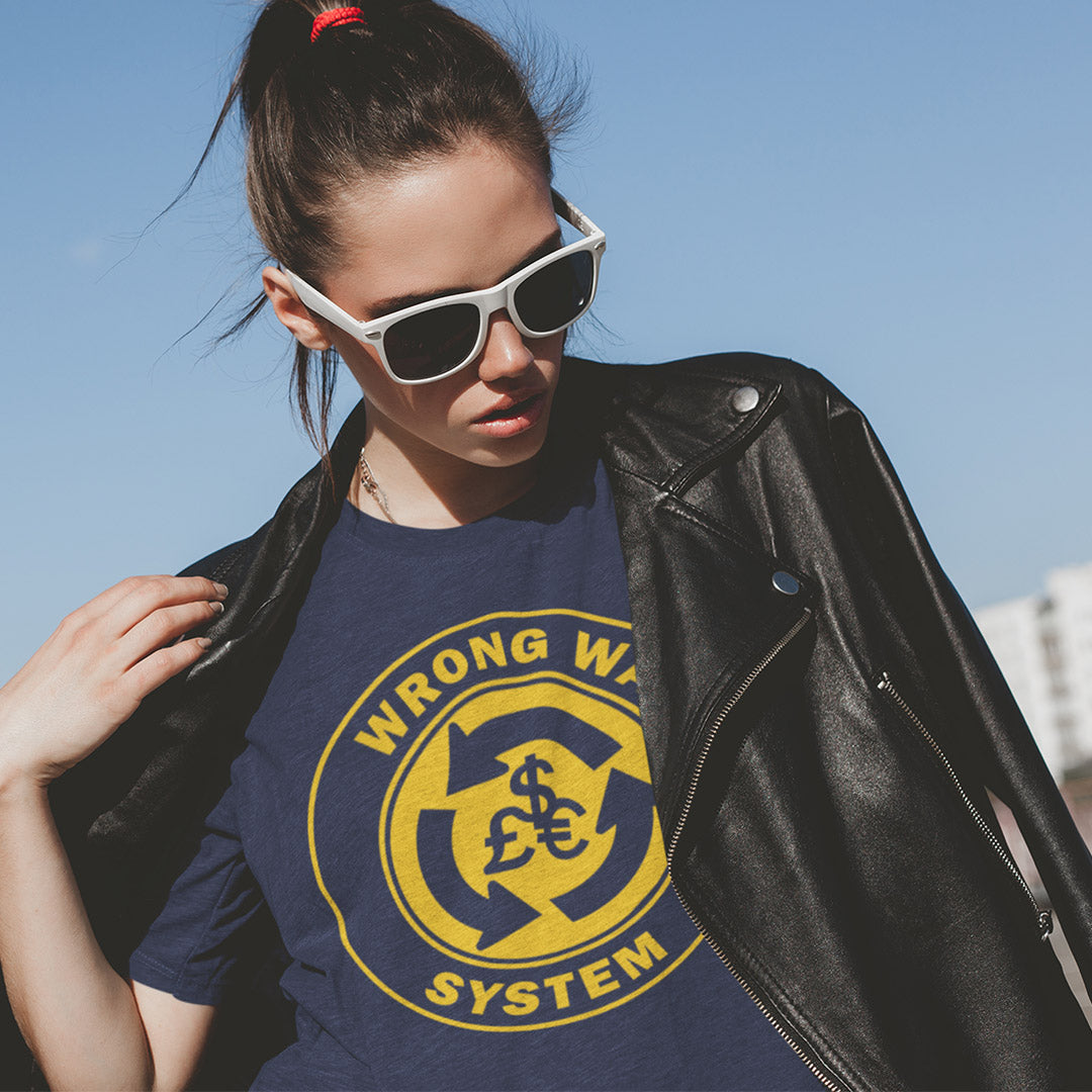 Person wearing a black leather jacket and a blue t-shirt with a yellow graphic and text. A non conformist t shirt in the form of a road sign reminder that it's possibly not been the best idea to build our society around money. Wrong direction, change the system ! Made from 100% organic ring-spun cotton, this social awareness t shirt is unisex, high-quality, super comfy, and best of all, eco-friendly. A great choice for an anti capitalist socio economic demonstration.