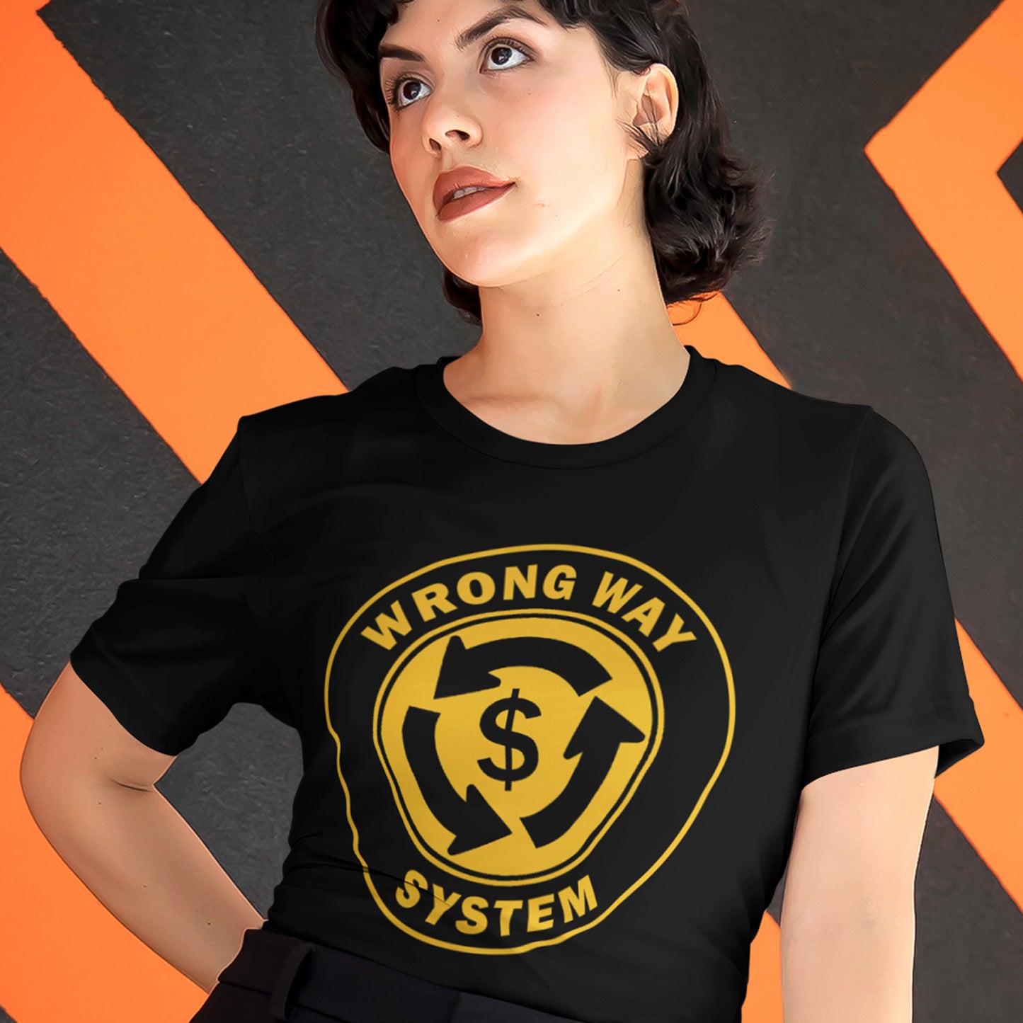Person wearing a black t-shirt with a yellow graphic and text against an orange and black striped background. A political t-shirt in the form of a road sign reminder that it's possibly not been the best idea to build our society around money. Wrong direction, change the system ! Made from 100% organic ring-spun cotton, this social awareness political t-shirt is unisex, high-quality, super comfy, and best of all, eco-friendly. A great choice for an anti-capitalist socio-economic demonstration.