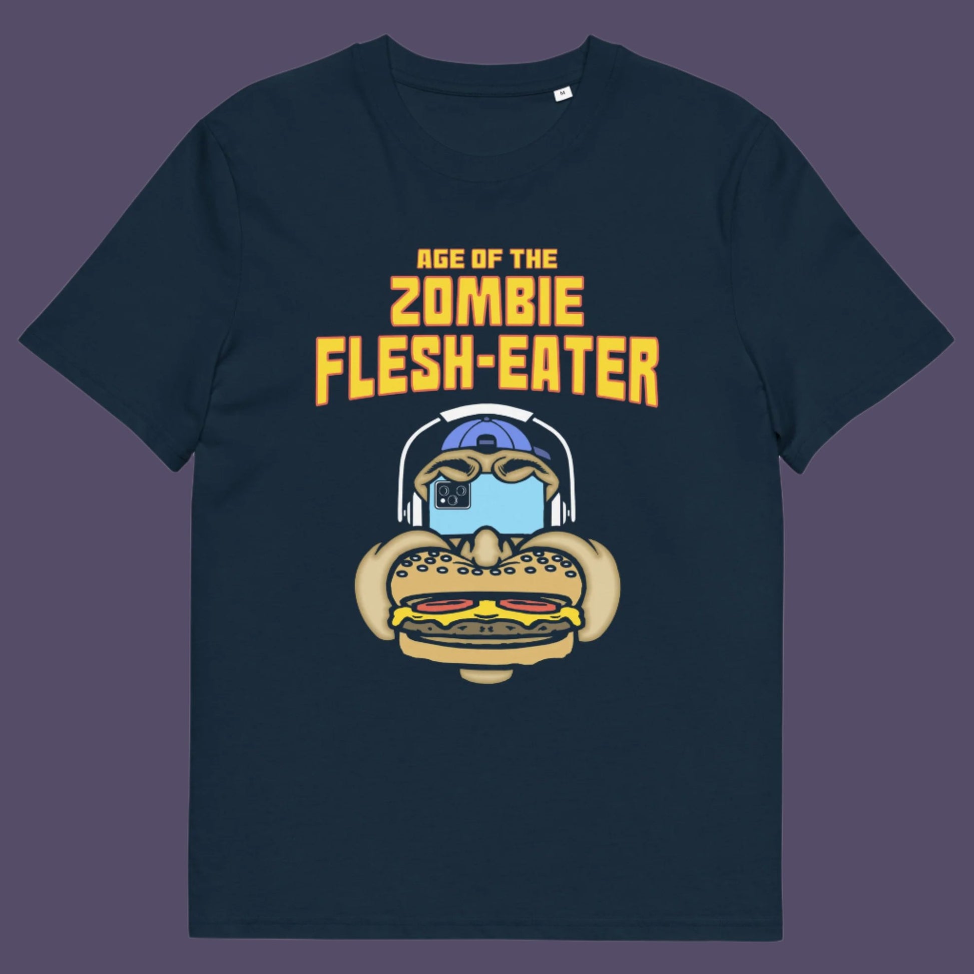 French navy t-shirt. This funny vegetarian t-shirt design plays on the interpretation of a late 70's B rate movie. As a modern day vegan surrounded by people hypnotised on their mobile phone while eating meat based fast food, you may be forgiven for thinking you are living in the age of the zombie flesh-eater. Made from 100% organic ring-spun cotton, this meat free t shirt design is unisex, high-quality, super comfy, and best of all, eco-friendly.