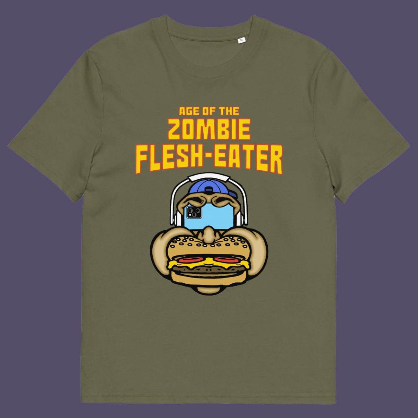 Khaki t shirt. This funny vegetarian t-shirt design plays on the interpretation of a late 70's B rate movie. As a modern day vegan surrounded by people hypnotised on their mobile phone while eating meat based fast food, you may be forgiven for thinking you are living in the age of the zombie flesh-eater. Made from 100% organic ring-spun cotton, this meat free t shirt design is unisex, high-quality, super comfy, and best of all, eco-friendly.