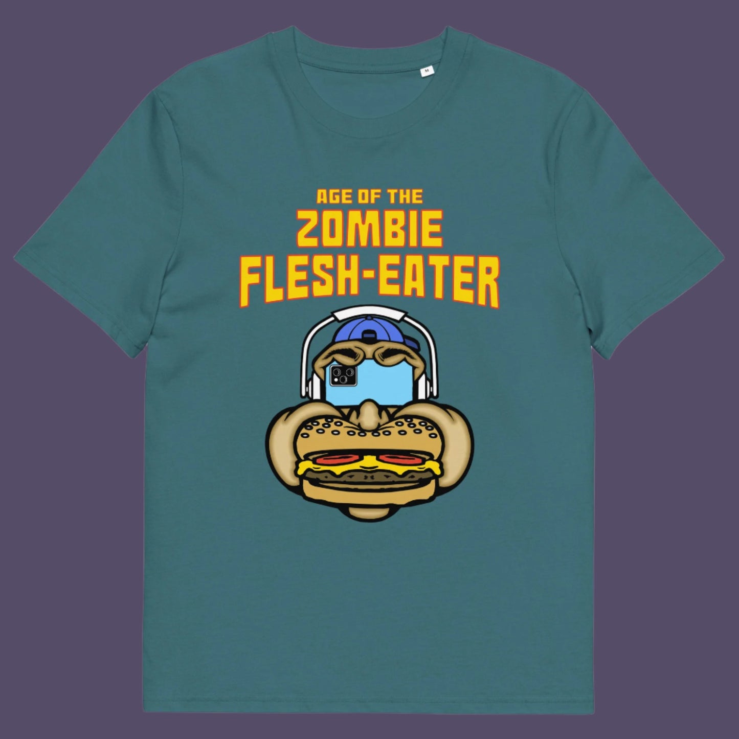 Stargazer t shirt. This funny vegetarian t-shirt design plays on the interpretation of a late 70's B rate movie. As a modern day vegan surrounded by people hypnotised on their mobile phone while eating meat based fast food, you may be forgiven for thinking you are living in the age of the zombie flesh-eater. Made from 100% organic ring-spun cotton, this meat free t shirt design is unisex, high-quality, super comfy, and best of all, eco-friendly.