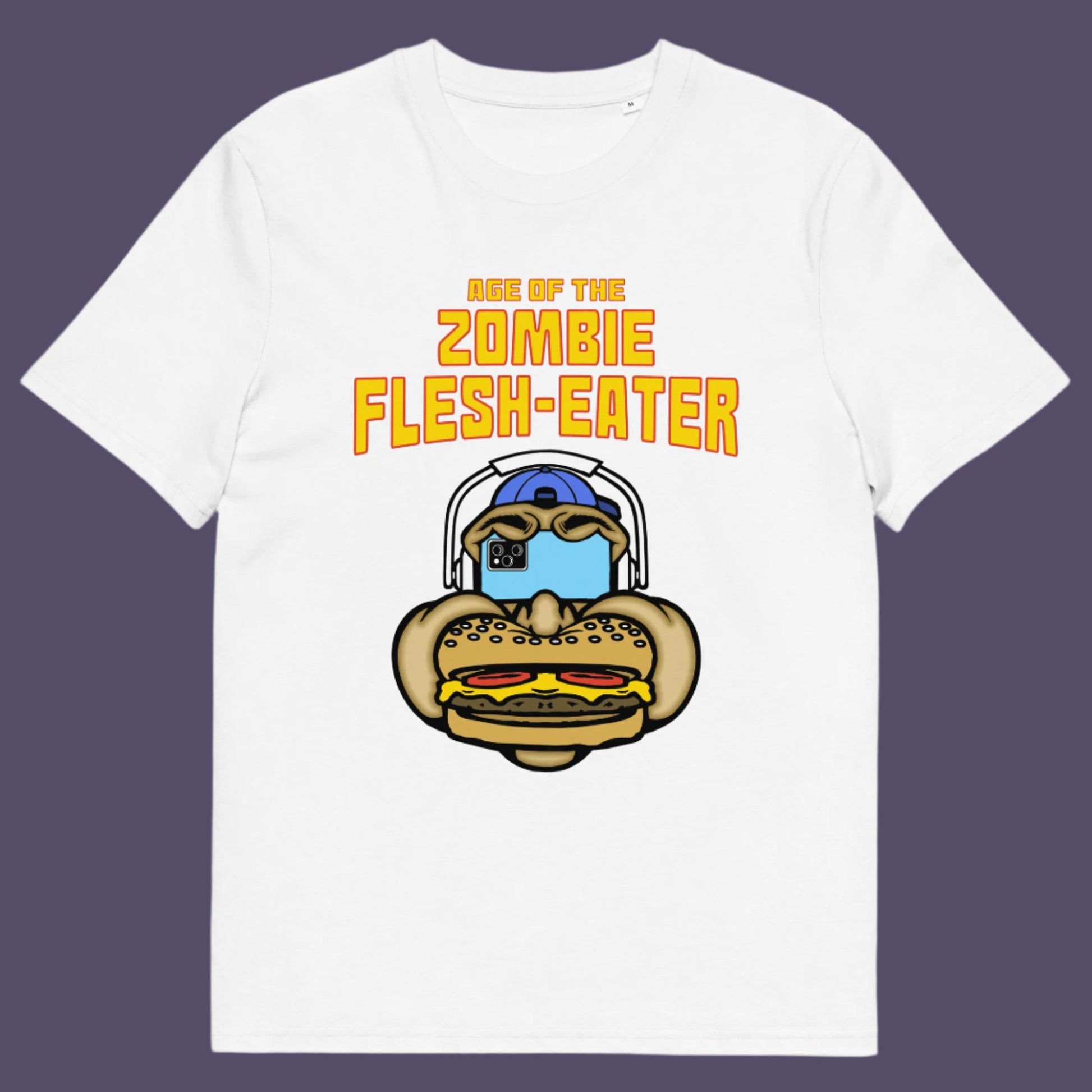 White t shirt. This funny vegetarian t-shirt design plays on the interpretation of a late 70's B rate movie. As a modern day vegan surrounded by people hypnotised on their mobile phone while eating meat based fast food, you may be forgiven for thinking you are living in the age of the zombie flesh-eater. Made from 100% organic ring-spun cotton, this meat free t shirt design is unisex, high-quality, super comfy, and best of all, eco-friendly.