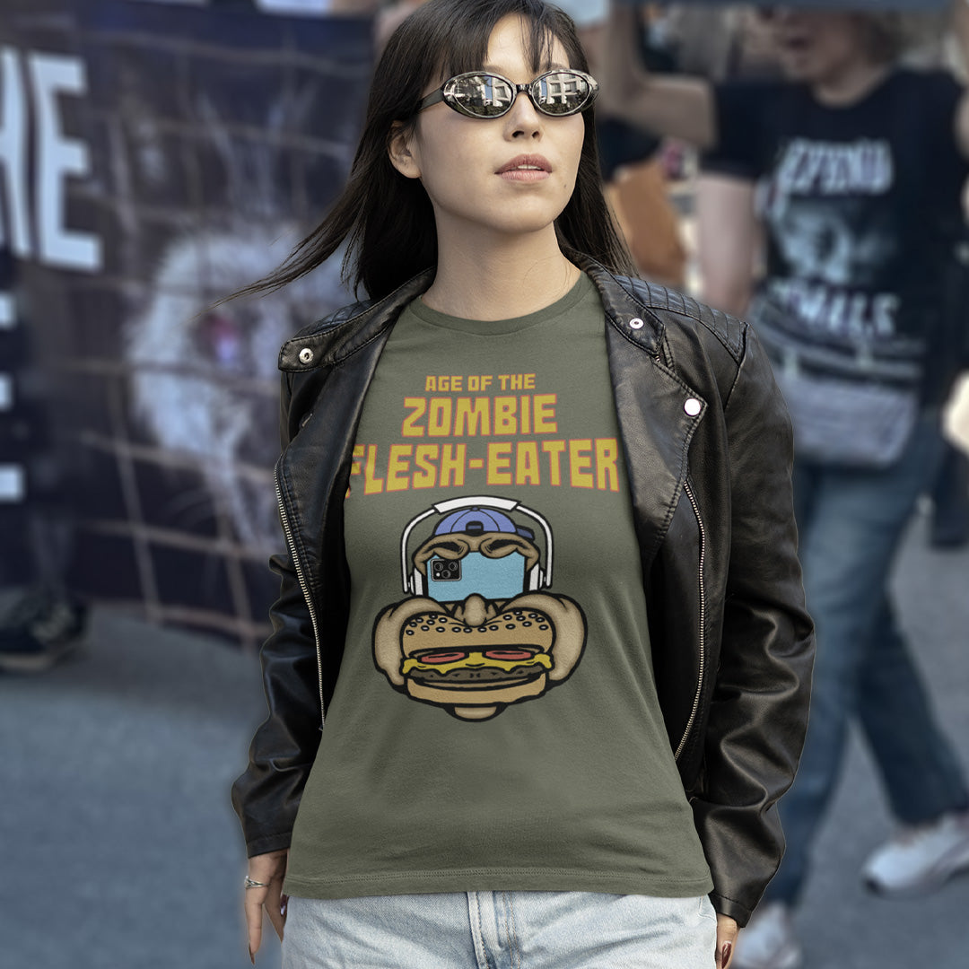 Woman at demo. This funny plant based t shirt design plays on the interpretation of a late 70's B rate movie. As a modern day vegan or vegetarian surrounded by people hypnotised on their mobile phone while eating meat based fast food, you may be forgiven for thinking you are living in the age of the zombie flesh-eater. Made from 100% organic ring-spun cotton, this meat free t shirt design is unisex, high-quality, super comfy, and best of all, eco-friendly.