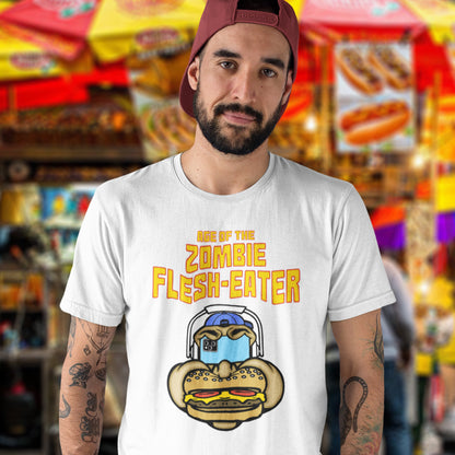 Man wearing a white t-shirt standing in a colourful background. This meat free t-shirt design plays on the interpretation of a late 70's B rate movie. As a modern day vegan surrounded by people hypnotised on their mobile phone while eating meat based fast food, you may be forgiven for thinking you are living in the age of the zombie flesh-eater. Made from 100% organic ring-spun cotton, this meat free t shirt design is unisex, high-quality, super comfy, and best of all, eco-friendly.