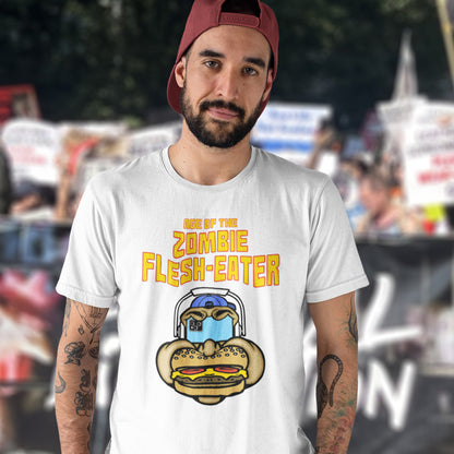 A man wearing a white t-shirt. This funny plant based t shirt design plays on the interpretation of a late 70's B rate movie. As a modern day vegan or vegetarian surrounded by people hypnotised on their mobile phone while eating meat based fast food, you may be forgiven for thinking you are living in the age of the zombie flesh-eater. Made from 100% organic ring-spun cotton, this meat free t shirt design is unisex, high-quality, super comfy, and best of all, eco-friendly.