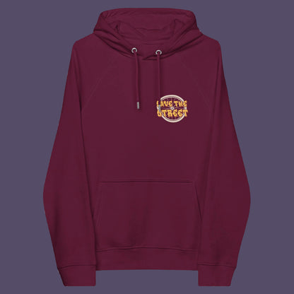 Burgundy hoodie front. This street art inspired hoodie design represents inner city street life as a culture of it's own. There is a ground level reality mixed with trustworthy honestly at street level in towns and cities across the planet. Wherever you are in the world, may the street be with you. Comfortable and practical. It's extra soft and has a convenient front pouch pocket. Made from organic cotton and recycled polyester, this street art hoodie is a great eco-friendly choice.